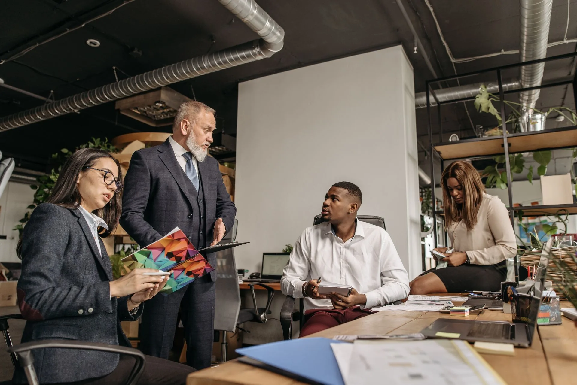 Business colleagues reviewing documents together